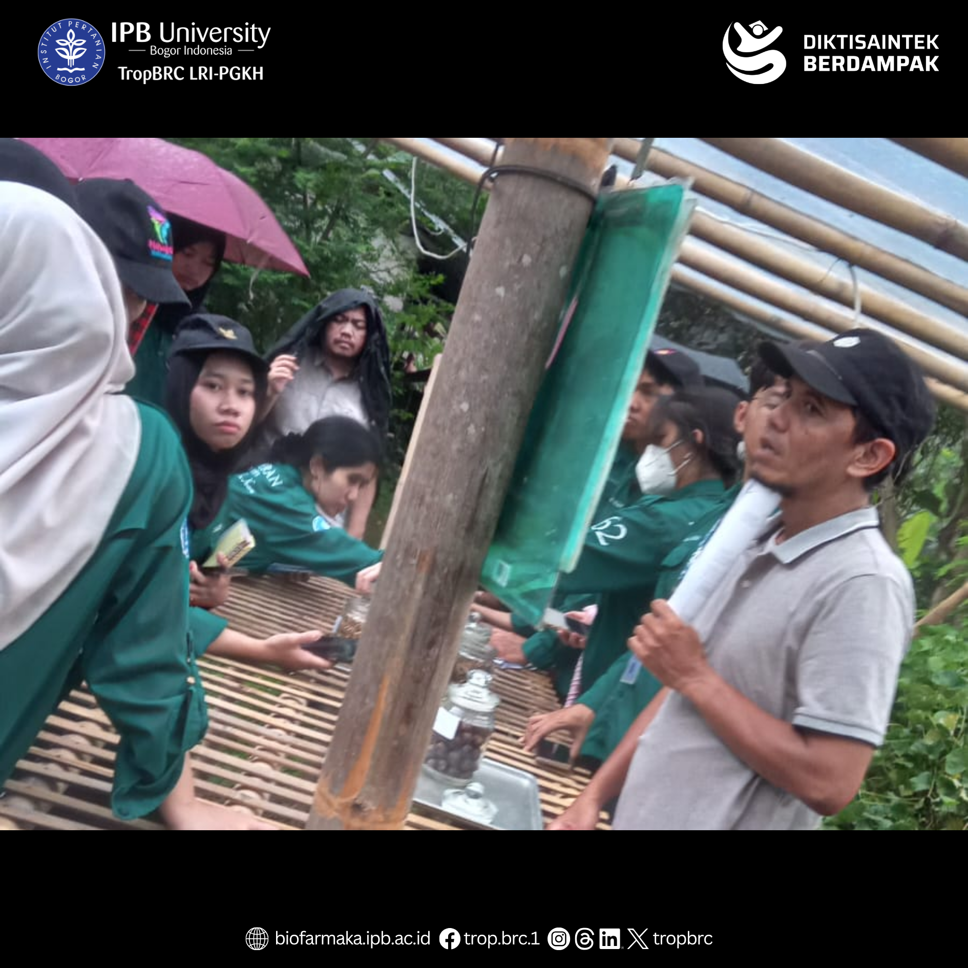 An instructor and students examine equipment used for processing tropical medicinal plants into simplicia.